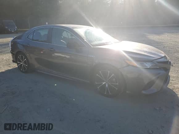 2020 Toyota Camry Hybrid SE с VIN 4T1G31AK0LU012573, выставлен на аукционе Copart как лот 85478245 с пробегом 68 865 миль миль и Списание • Salvage title. История ставок и продаж доступна на DreamBid. Изображение 4.