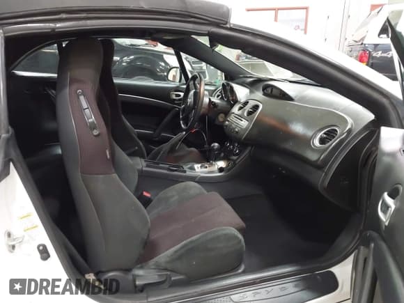 ✅ 2012 Mitsubishi Eclipse GS Sport • VIN: 4A37L2EF6CE003648 • Lot: 42209800. Wystawiony na IAAI z przebiegiem 146 167 mil. Bezpłatny archiwum sprzedaży aukcyjnych z USA i szczegółowy raport historii pojazdu na DreamBid. Zdjęcie 5.