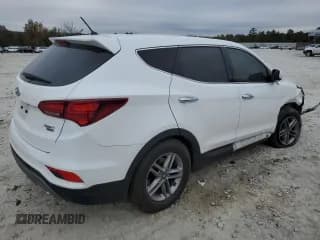 ✅ 2018 Hyundai Santa Fe 2.4L • VIN: 5NMZTDLB7JH098996 • Лот: 64157592. Опубликован ранее на Copart с пробегом 94 097 миль. Бесплатный доступ к архиву аукционных продаж из США и подробный отчёт об истории автомобиля на DreamBid. Изображение 4.