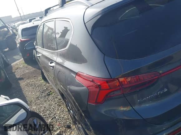 2023 Hyundai Santa Fe Calligraphy with VIN 5NMS54AL5PH613137, listed as a IAAI auction lot 43221208 with 28,585 mi miles and . Bid and sale history available at DreamBid. Image 3.