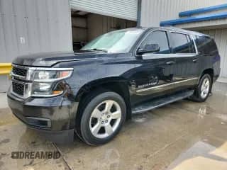 2015 Chevrolet Suburban LT с VIN 1GNSCJKCXFR243601, выставлен на аукционе Copart как лот 81587885 с пробегом 211 539 миль миль и Чистый • Clean title. История ставок и продаж доступна на DreamBid. Изображение 1.