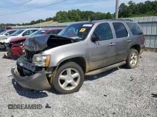 2011 Chevrolet Tahoe LT with VIN 1GNSCBE09BR354478, listed as a Copart auction lot 66722225 with 200,582 mi miles and Salvage title. Bid and sale history available at DreamBid. Image 1.
