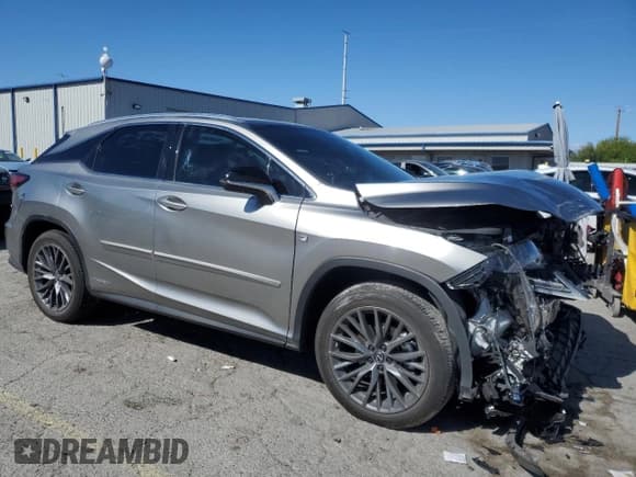 ✅ 2022 Lexus RX 450h F Sport • VIN: 2T2YGMDA7NC088479 • Lot: 54876625. Listed on Copart with 29,953 mi. Free auction sales archive from the USA and detailed vehicle history report at DreamBid. Image 4.