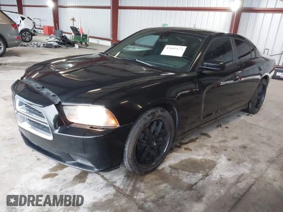 ✅ 2013 Dodge Charger SE • VIN: 2C3CDXBG3DH720189 • Lot: 43682173. Listed on IAAI with 210,704 mi. Free auction sales archive from the USA and detailed vehicle history report at DreamBid. Image 2.