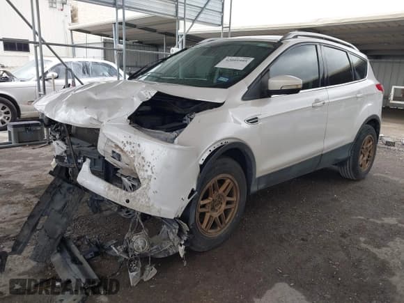 ✅ 2015 Ford Escape Titanium • VIN: 1FMCU0J91FUA27610 • Lot: 42095995. Listed on IAAI with 122,521 mi. Free auction sales archive from the USA and detailed vehicle history report at DreamBid. Image 2.