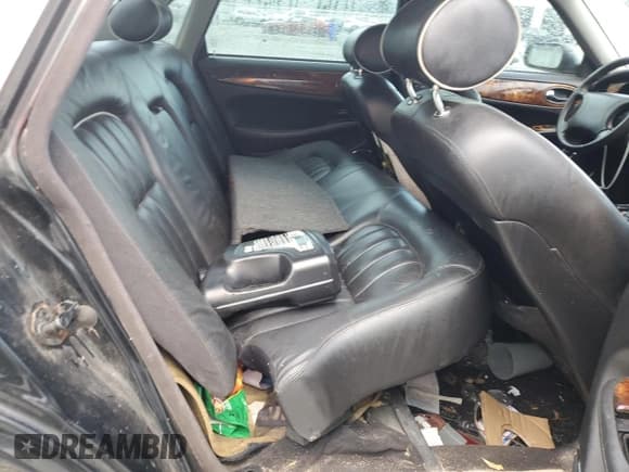 ✅ 2000 Jaguar XJ • VIN: SAJDA14C1YLF03320 • Lot: 65401035. Listed on Copart with 114,255 mi. Free auction sales archive from the USA and detailed vehicle history report at DreamBid. Image 10.