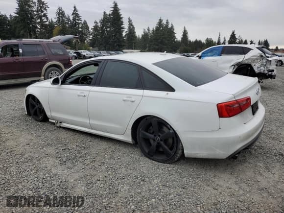 ✅ 2014 Audi S6 Prestige • VIN: WAUF2AFC5EN055448 • Лот: 73227954. Опубликован ранее на Copart с пробегом 98 994 миль. Бесплатный доступ к архиву аукционных продаж из США и подробный отчёт об истории автомобиля на DreamBid. Изображение 2.