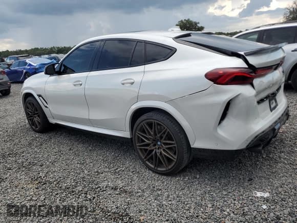 ✅ 2020 BMW X6 M Competition • VIN: 5YMCY0C04L9B05670 • Lot: 64015475. Listed on Copart with 65,235 mi. Free auction sales archive from the USA and detailed vehicle history report at DreamBid. Image 2.