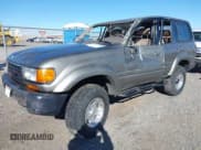 ✅ 1997 Toyota Land Cruiser • VIN: JT3HJ85JXV0174430 • Lot: 41502690. Listed on IAAI with 300,632 mi. Free auction sales archive from the USA and detailed vehicle history report at DreamBid. Image 2.