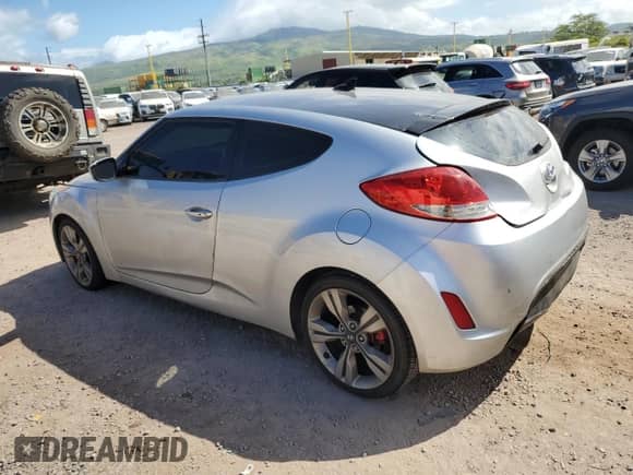 2013 Hyundai Veloster w/Gray Int с VIN KMHTC6AD3DU100368, выставлен на аукционе Copart как лот 56896614 с пробегом 103 381 миль миль и Чистый • Clean title. История ставок и продаж доступна на DreamBid. Изображение 2.