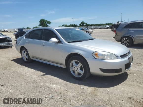 2014 Chevrolet Impala Police Police with VIN 2G1WD5E37E1180502, listed as a Copart auction lot 56597185 with 84,426 mi miles and Salvage title. Bid and sale history available at DreamBid. Image 4.