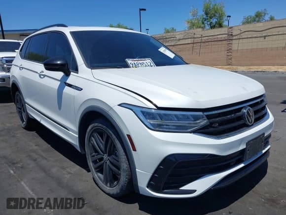 ✅ 2022 Volkswagen Tiguan SE R-Line Black • VIN: 3VVCB7AX3NM073218 • Лот: 42254388. Опубликован ранее на IAAI с пробегом 31 998 миль. Бесплатный доступ к архиву аукционных продаж из США и подробный отчёт об истории автомобиля на DreamBid. Изображение 1.