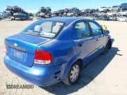 ✅ 2005 Chevrolet Aveo LS • VIN: KL1TD526X5B399695 • Lot: 42048951. Listed on IAAI with 128,466 mi. Free auction sales archive from the USA and detailed vehicle history report at DreamBid. Image 4.