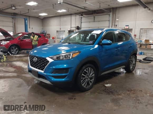 2020 Hyundai Tucson SEL z VIN KM8J3CAL4LU192330, wystawiony jako IAAI lot #41915238 z przebiegiem 53 472 mil mil oraz . Historia ofert i sprzedaży dostępna na DreamBid. Obrazek 2.