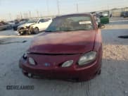 ✅ 1998 Ford Escort ZX2 Cool • VIN: 3FAKP1130WR260321 • Lot: 73996074. Wystawiony na Copart z przebiegiem 62 842 mil. Bezpłatny archiwum sprzedaży aukcyjnych z USA i szczegółowy raport historii pojazdu na DreamBid. Zdjęcie 5.