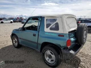 ✅ 1996 Chevrolet Tracker • VIN: 2CNBJ1869T6903615 • Лот: 49690055. Опубликован ранее на Copart с пробегом 144 821 миль. Бесплатный доступ к архиву аукционных продаж из США и подробный отчёт об истории автомобиля на DreamBid. Изображение 2.