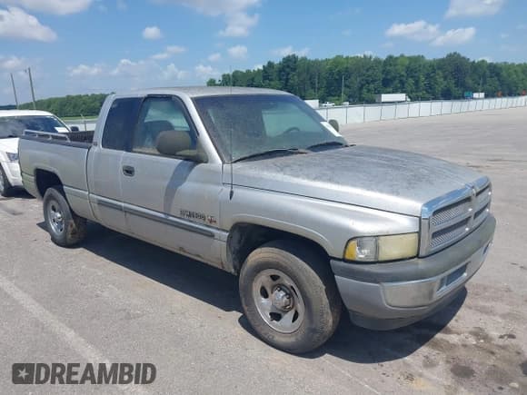 ✅ 2001 Dodge 1500 • VIN: 3B7HC13Y21G718471 • Lot: 42558873. Listed on IAAI with 265,209 mi. Free auction sales archive from the USA and detailed vehicle history report at DreamBid. Image 1.