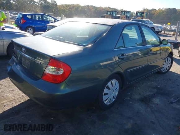 ✅ 2002 Toyota Camry LE • VIN: 4T1BE32K82U519444 • Лот: 43501990. Опубликован ранее на IAAI с пробегом 210 935 миль. Бесплатный доступ к архиву аукционных продаж из США и подробный отчёт об истории автомобиля на DreamBid. Изображение 4.