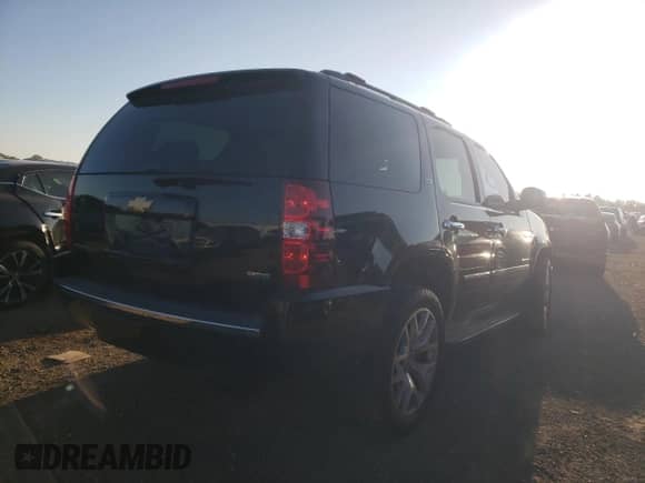 2011 Chevrolet Tahoe LTZ с VIN 1GNSKCE03BR366604, выставлен на аукционе Copart как лот 71586985 с пробегом 183 747 миль миль и Списание • Salvage title. История ставок и продаж доступна на DreamBid. Изображение 3.