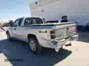 2005 Dodge Dakota SLT with VIN 1D7HW42N75S164042, listed as a Copart auction lot 57322854 with 184,609 mi miles and Salvage title. Bid and sale history available at DreamBid. Image 2.