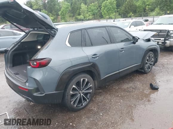 ✅ 2023 Mazda CX-50 S Premium Plus • VIN: 7MMVABEMXPN104518 • Lot: 42184893. Wystawiony na IAAI z przebiegiem 61 991 mil. Bezpłatny archiwum sprzedaży aukcyjnych z USA i szczegółowy raport historii pojazdu na DreamBid. Zdjęcie 4.