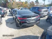 ✅ 2022 BMW 8 Series M850i xDrive • VIN: WBABC4C06NCG86571 • Lot: 43616622. Listed on IAAI with 5,383 mi. Free auction sales archive from the USA and detailed vehicle history report at DreamBid. Image 3.