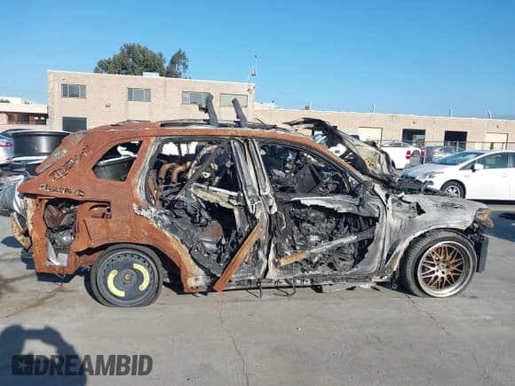 ✅ 2021 BMW X5 M50i • VIN: 5UXJU4C09M9E08690 • Lot: 43831338. Listed on IAAI with Not provided. Free auction sales archive from the USA and detailed vehicle history report at DreamBid. Image 13.