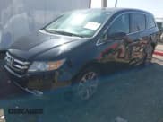 ✅ 2014 Honda Odyssey Touring • VIN: 5FNRL5H98EB095382 • Lot: 42105557. Listed on IAAI with 139,524 mi. Free auction sales archive from the USA and detailed vehicle history report at DreamBid. Image 2.