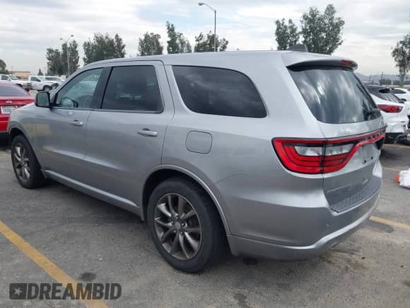 2014 Dodge Durango SXT with VIN 1C4RDHAG8EC523987, listed as a IAAI auction lot 43401258 with 190,306 mi miles and . Bid and sale history available at DreamBid. Image 3.