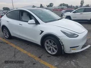 ✅ 2022 Tesla Model Y Long Range • VIN: 7SAYGAEE7NF486066 • Lot: 43666862. Listed on IAAI with 57,624 mi. Free auction sales archive from the USA and detailed vehicle history report at DreamBid. Image 1.