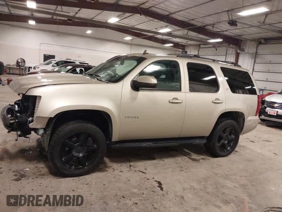 ✅ 2013 Chevrolet Tahoe LT • VIN: 1GNSKBE08DR215142 • Lot: 43665019. Listed on IAAI with 203,239 mi. Free auction sales archive from the USA and detailed vehicle history report at DreamBid. Image 15.