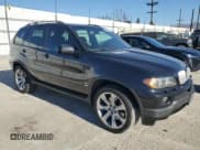✅ 2005 BMW X5 4.8is • VIN: 5UXFA93505LE83127 • Лот: 81653374. Опубликован ранее на Copart с пробегом 148 054 миль. Бесплатный доступ к архиву аукционных продаж из США и подробный отчёт об истории автомобиля на DreamBid. Изображение 4.
