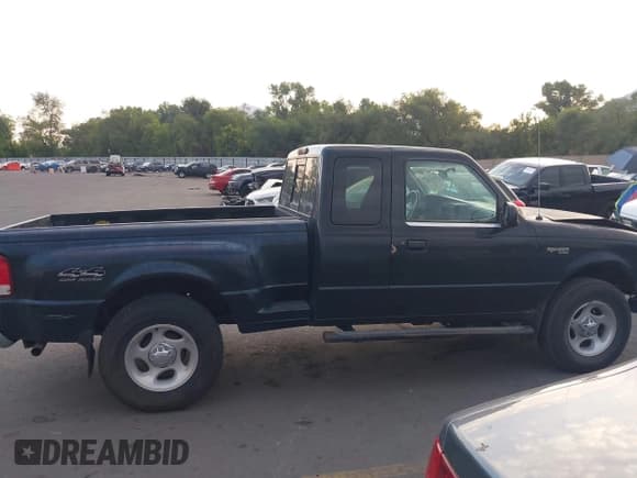 ✅ 2000 Ford Ranger XLT • VIN: 1FTZR15X6YPB43496 • Lot: 43144784. Listed on IAAI with 166,660 mi. Free auction sales archive from the USA and detailed vehicle history report at DreamBid. Image 13.