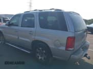 ✅ 2004 Cadillac Escalade • VIN: 1GYEK63N14R200973 • Lot: 42926800. Listed on IAAI with 261,068 mi. Free auction sales archive from the USA and detailed vehicle history report at DreamBid. Image 3.