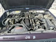 ✅ 1991 Jeep Cherokee • VIN: 1J4FJ88S0ML569019 • Lot: 85327315. Wystawiony na Copart z przebiegiem 189 038 mil. Bezpłatny archiwum sprzedaży aukcyjnych z USA i szczegółowy raport historii pojazdu na DreamBid. Zdjęcie 12.