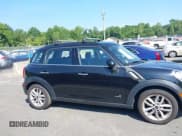 ✅ 2014 MINI Countryman S • VIN: WMWZC5C59EWM17315 • Lot: 42915811. Listed on IAAI with 105,312 mi. Free auction sales archive from the USA and detailed vehicle history report at DreamBid. Image 13.
