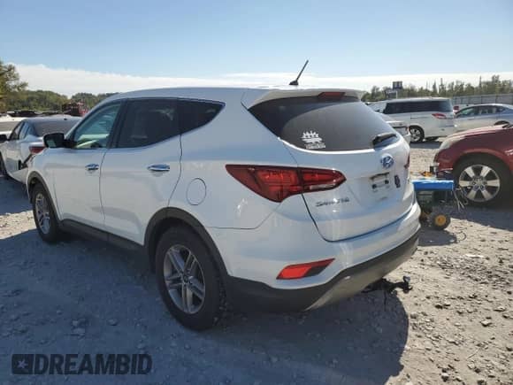 2018 Hyundai Santa Fe 2.4L with VIN 5NMZT3LBXJH077926, listed as a Copart auction lot 86124935 with 193,067 mi miles and Salvage title. Bid and sale history available at DreamBid. Image 2.
