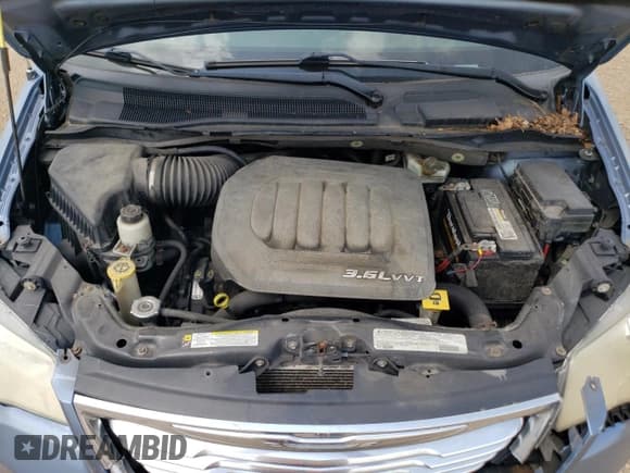 ✅ 2012 Chrysler Town & Country Touring L • VIN: 2C4RC1CG5CR169860 • Лот: 66026225. Опубликован ранее на Copart с пробегом 251 601 миль. Бесплатный доступ к архиву аукционных продаж из США и подробный отчёт об истории автомобиля на DreamBid. Изображение 12.