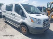 ✅ 2018 Ford Transit • VIN: 1FTYR1YM1JKA89833 • Lot: 41833114. Listed on IAAI with 201,883 mi. Free auction sales archive from the USA and detailed vehicle history report at DreamBid. Image 1.