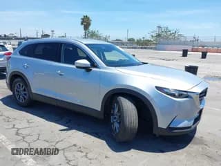 ✅ 2020 Mazda CX-9 Touring • VIN: JM3TCACY0L0424155 • Lot: 42688501. Wystawiony na IAAI z przebiegiem 60 142 mil. Bezpłatny archiwum sprzedaży aukcyjnych z USA i szczegółowy raport historii pojazdu na DreamBid. Zdjęcie 1.