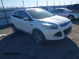 ✅ 2013 Ford Escape Titanium • VIN: 1FMCU0J93DUB00098 • Lot: 41693605. Listed on IAAI with 172,862 mi. Free auction sales archive from the USA and detailed vehicle history report at DreamBid. Image 1.