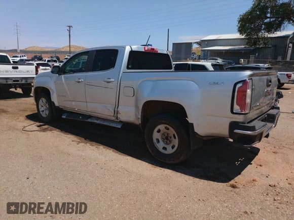 ✅ 2015 GMC Canyon 4WD SLE • VIN: 1GTG6BE31F1118959 • Lot: 67645865. Wystawiony na Copart z przebiegiem 132 299 mil. Bezpłatny archiwum sprzedaży aukcyjnych z USA i szczegółowy raport historii pojazdu na DreamBid. Zdjęcie 2.
