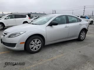 ✅ 2013 Mazda 6 i Sport • VIN: 1YVHZ8BH4D5M14296 • Lot: 60805645. Listed on Copart with 129,958 mi. Free auction sales archive from the USA and detailed vehicle history report at DreamBid. Image 1.
