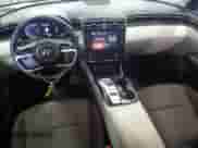 2023 Hyundai Tucson Blue z VIN KM8JBCA12PU091438, wystawiony jako Copart lot #57264655 z przebiegiem 72 768 mil mil oraz Szkoda całkowita • Salvage title. Historia ofert i sprzedaży dostępna na DreamBid. Obrazek 8.