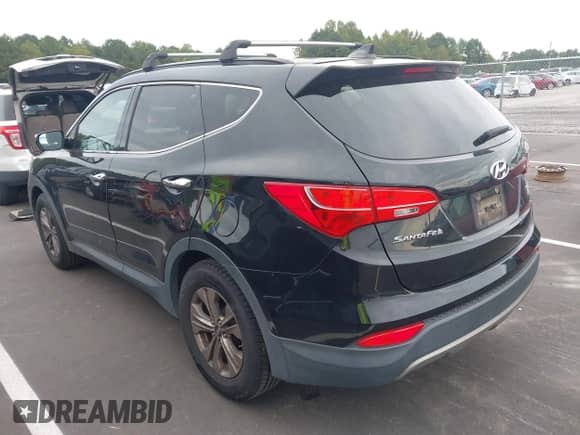 2016 Hyundai Santa Fe z VIN 5XYZUDLB4GG372753, wystawiony jako IAAI lot #43239818 z przebiegiem 134 901 mil mil oraz . Historia ofert i sprzedaży dostępna na DreamBid. Obrazek 3.