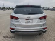 ✅ 2017 Hyundai Santa Fe 2.4L • VIN: 5XYZT3LB5HG437527 • Лот: 51944894. Опубликован ранее на Copart с пробегом 111 221 миль. Бесплатный доступ к архиву аукционных продаж из США и подробный отчёт об истории автомобиля на DreamBid. Изображение 6.