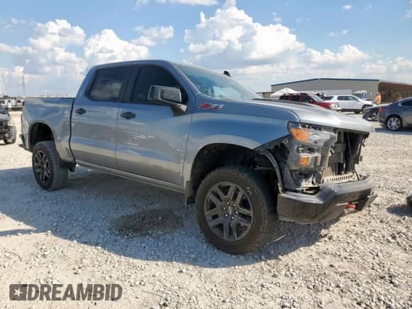 2023 Chevrolet Silverado 1500 Custom Trail Boss with VIN 3GCUDCED8PG338531, listed as a Copart auction lot 82054715 with 82,755 mi miles and Salvage title. Bid and sale history available at DreamBid. Image 4.