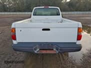 ✅ 2004 Toyota Tacoma • VIN: 5TENL42N14Z393901 • Lot: 95465585. Listed on Copart with 137,730 mi. Free auction sales archive from the USA and detailed vehicle history report at DreamBid. Image 6.