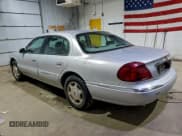 ✅ 2001 Lincoln Continental • VIN: 1LNHM97V91Y680573 • Lot: 93828455. Wystawiony na Copart z przebiegiem 94 550 mil. Bezpłatny archiwum sprzedaży aukcyjnych z USA i szczegółowy raport historii pojazdu na DreamBid. Zdjęcie 2.