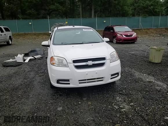 2009 Chevrolet Aveo 1LT z VIN KL1TD56E29B382736, wystawiony jako Copart lot #87038674 z przebiegiem 177 623 mil mil oraz Szkoda całkowita • Salvage title. Historia ofert i sprzedaży dostępna na DreamBid. Obrazek 10.